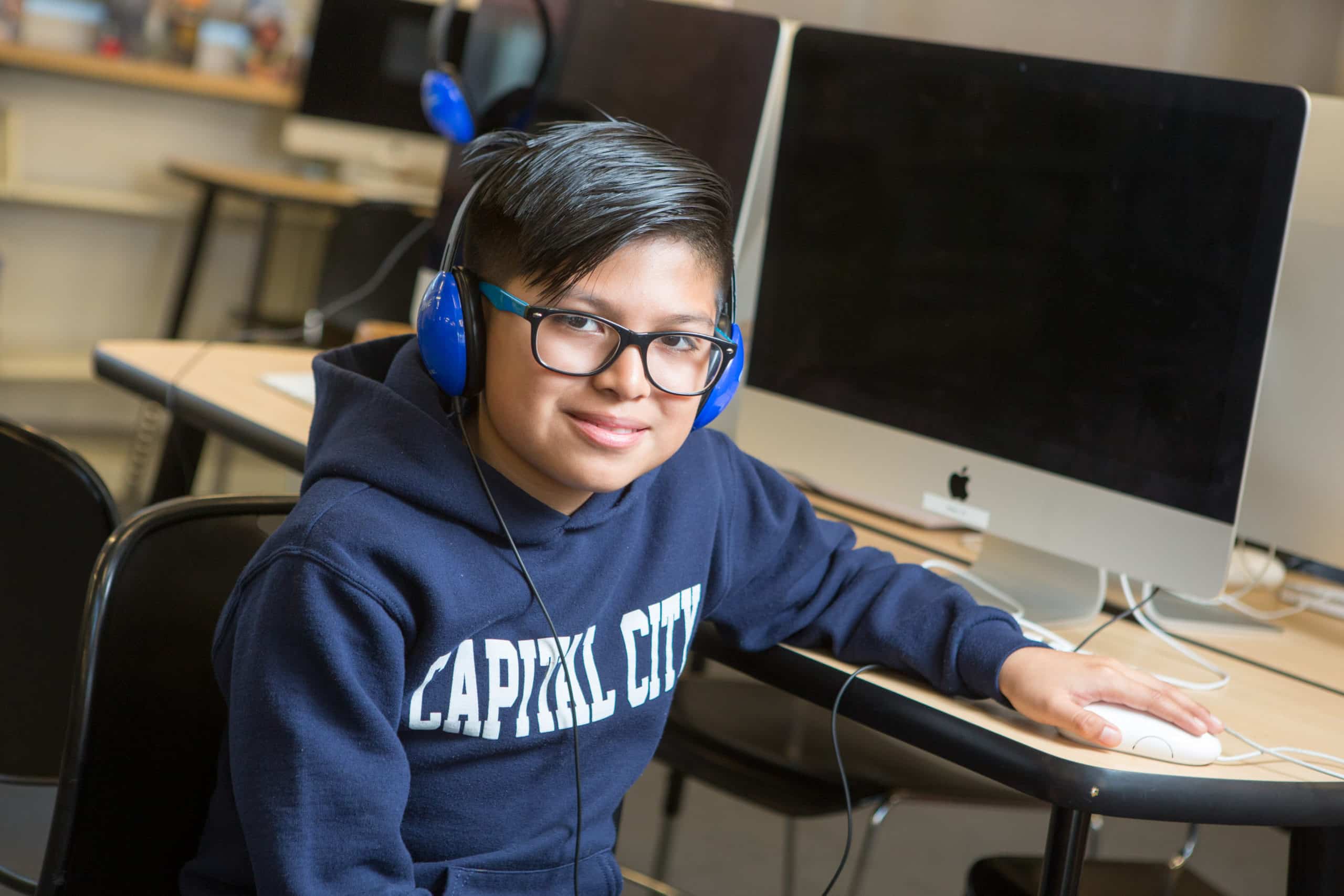 Middle school boy at computer